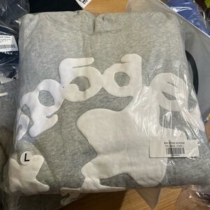 Grey Sp5der hoodie with star design
